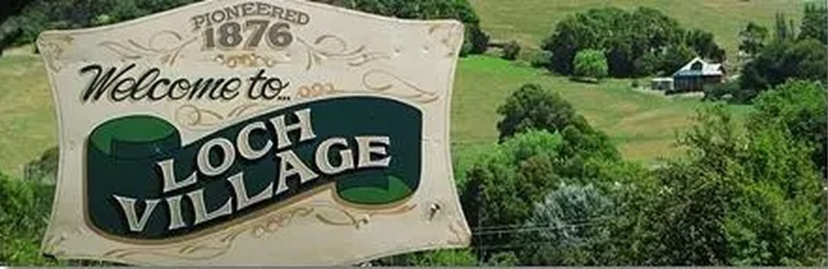 The welcome sign at Loch Village